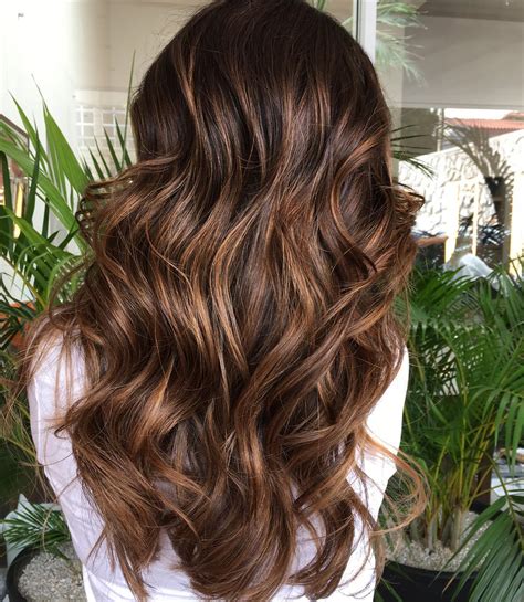 Learn how to lighten and brighten your brown hair with highlights in various colors and styles. . Chocolate brown hair with highlights